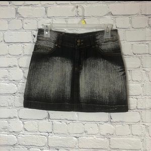 Dolce and Gabbana denim mini skirt.